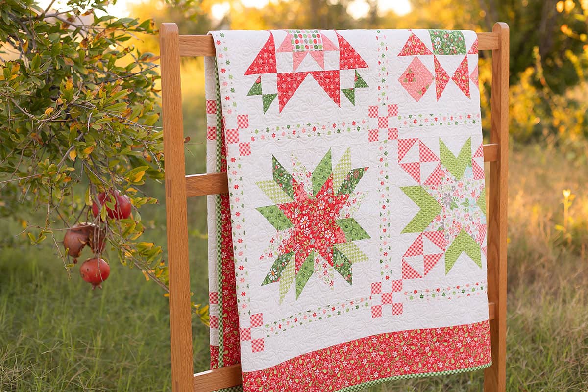 Poinsettia Stars Block of the Month quilt by Sherri McConnell from A Quilting Life