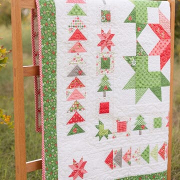 Wreath & Pine Medallion Quilt by Sherri McConnell of A Quilting Life with fabrics from Poinsettia & Pear by Sherri & Chelsi for Moda Fabrics