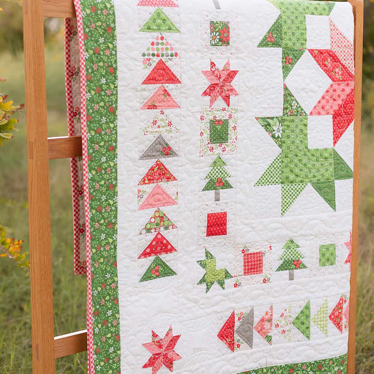 Wreath & Pine Medallion Quilt by Sherri McConnell of A Quilting Life with fabrics from Poinsettia & Pear by Sherri & Chelsi for Moda Fabrics