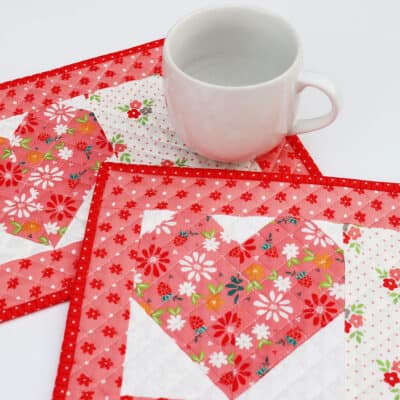 Heart Mug Rugs in fabrics by Sherri & Chelsi for Moda Fabrics