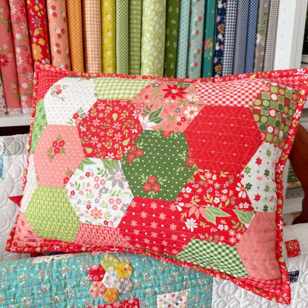 Half-Hexagon Pillow in Poinsettia & Pear Fabrics by Sherri & Chelsi for Moda Fabrics