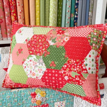 Half-Hexagon Pillow in Poinsettia & Pear Fabrics by Sherri & Chelsi for Moda Fabrics
