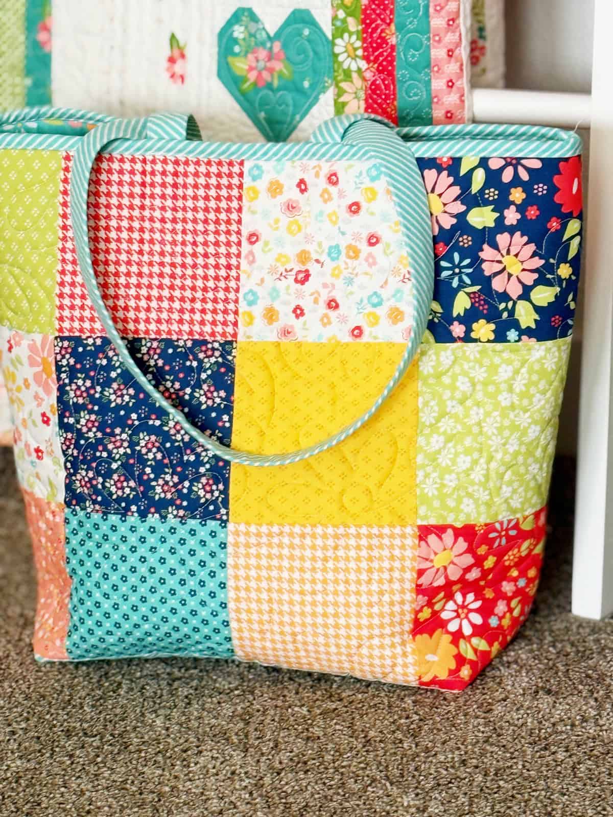 Charm Pack Tote in Delightfully Yours fabrics by Sherri from A Quilting Life
