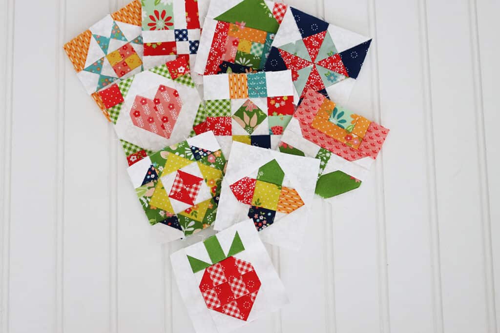 Sewcialites 3 blocks with block 10 Little Berry Block sewn by Sherri McConnell of A Quilting Life