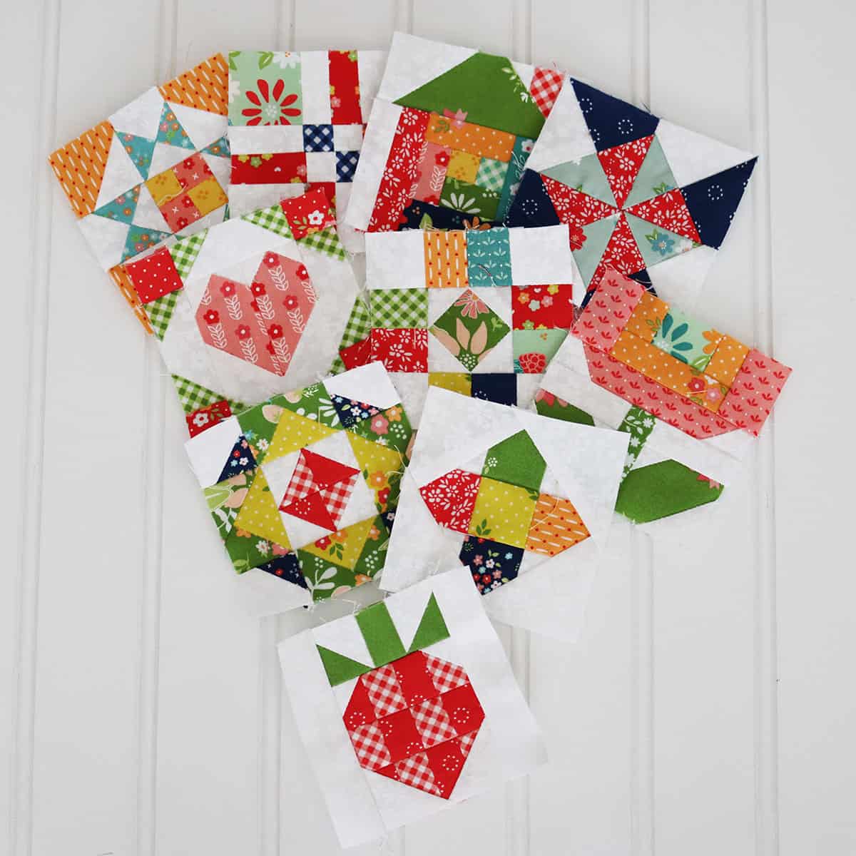 Sewcialites 3 blocks with block 10 Little Berry Block sewn by Sherri McConnell of A Quilting Life