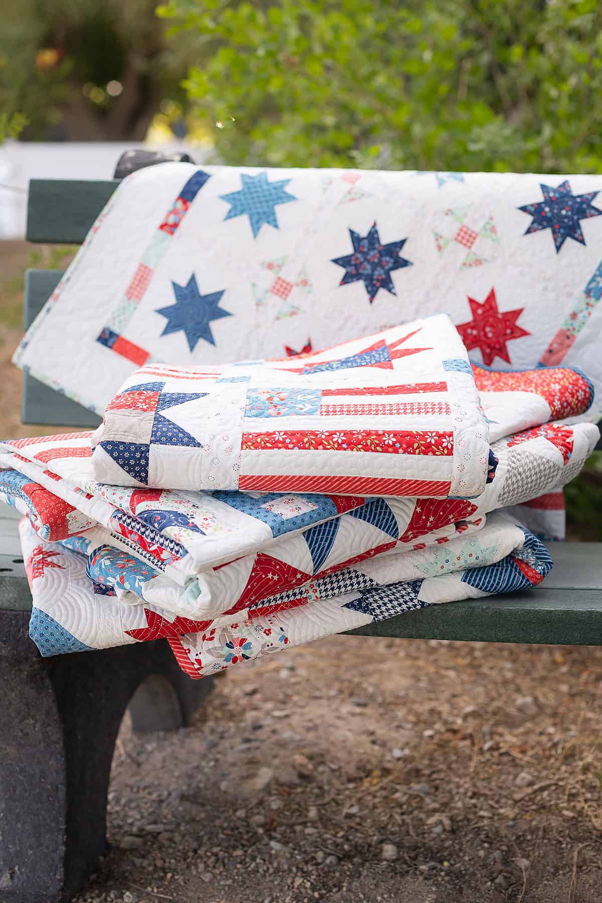Quilt stack in Midsummer fabrics by Sherri & Chelsi for Moda Fabrics