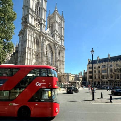Red Bus on city street in England 2026